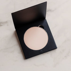 Candid Naturals 02 Sheer Medium Setting Powder pan open in its compact